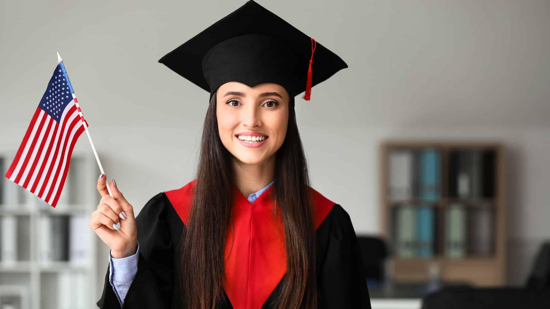 American student waving an American flag